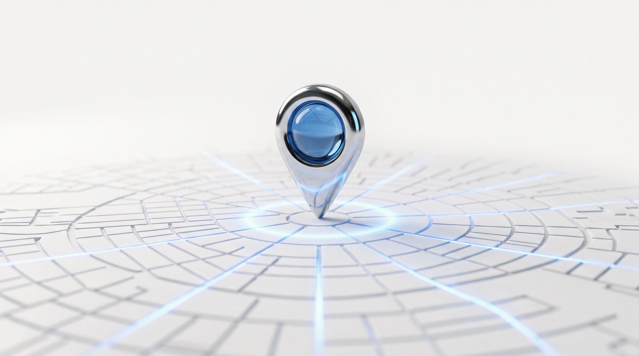 Repère de carte en chrome au cœur de verre bleu planté sur un plan de ville blanc aux rues lumineuses